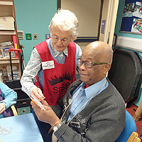 Photo of Margaret in craft room with SRSB client