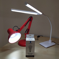Photograph of two lamps and a bulb