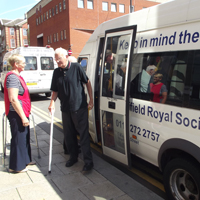 Photograph of SRSB minibus dropping off a client at the Mappin Street Centre