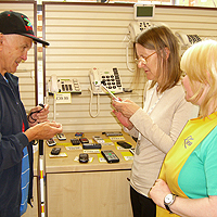 Photograph of clients and staff in SRSBs Equipment Centre