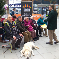 Photograph of the singing group at the train station in Sheffield