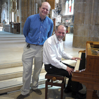 Photo of Bill and Ed with piano