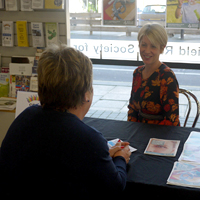 Photo of solicitor chatting to someone in SRSB reception