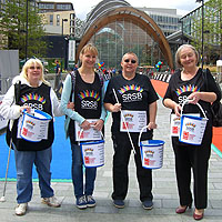 Photograph of four SRSB volunteers at an outdoor collection
