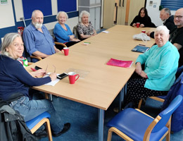 Photograph of a meeting in the centre 