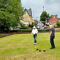 Photo of some people on the bowling green