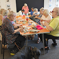 Photo of people working in the craft group