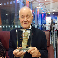 Photo of Graham with his award in 2019