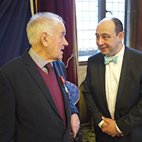 Photo of Graham at the Town Hall speaking to the French Honorary Consul 