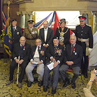 Graham at the Town Hall with the other people who were presented the Legion D Honneur