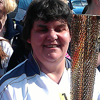 Photograph of Julie with the Olympic Torch