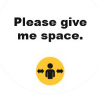 Photo of badge saying please give me space