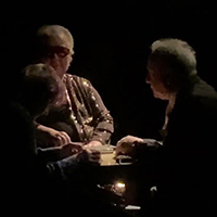 Photo of Anne, Kate and Mick creating music
