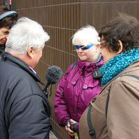 Photograph of SRSB clients being interviewed by Peter White