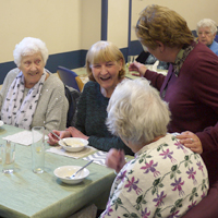 Photograph of clients and staff at Activities Centre