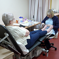 Photograph of SRSB client with Chiropodist