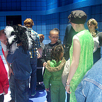 Photo of children having 'touch tour' at pantomime