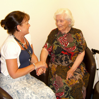 Photograph of SRSB client chatting to Befriending Volunteer