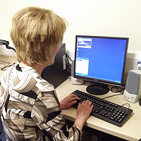 Photograph of a client using a computer