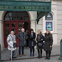 Photograph of some of Culture Club group outside theatre 