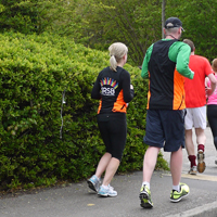 Photo of some people running