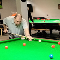 Photo of someone playing snooker