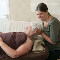 Photo of Sarah doing treatment