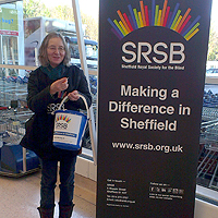 Photograph of Barbara at a store collection